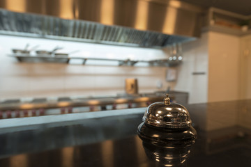 Restaurant bell on bar with bokeh,blurred background