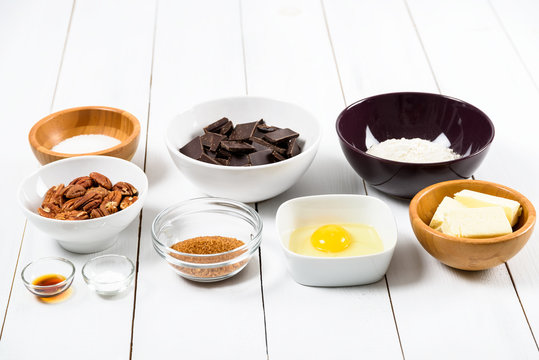 Food Ingredients For Pecan Chocolate Cookies On Kitchen Table