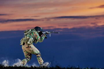 Military soldier attacks with machine gun