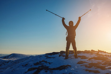 Fototapeta premium man hikers tourist celebrating success standing on top, at peak
