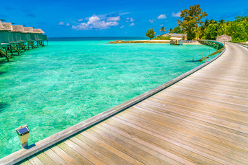 Beautiful water villas in tropical Maldives island  .