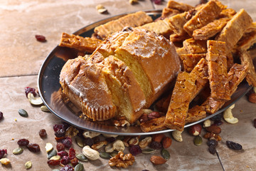 Cupcake with almond cookies , nuts and dried fruits
