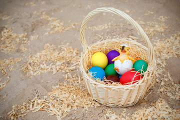 Basket full of colorful eggs