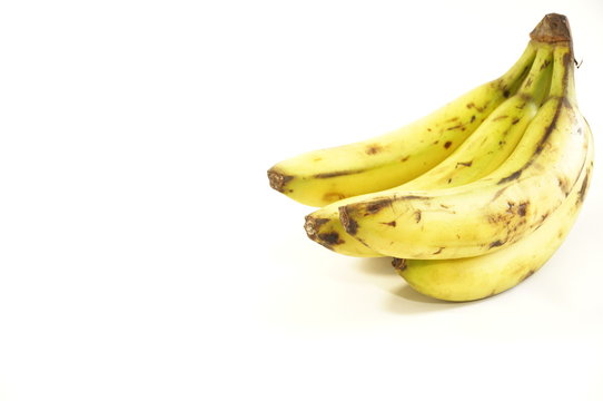 Ripe sweet bananas, isolated on a white background