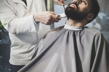 bearded businessman at a barber’s