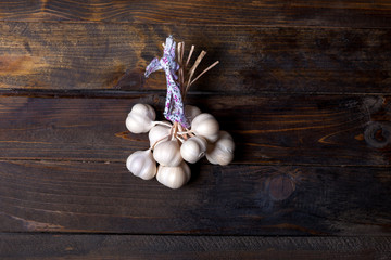 Bunch of garlic on wooden background