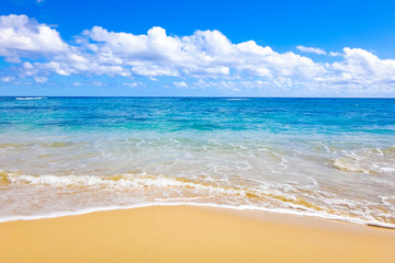 Blue tropical sea with clouds
