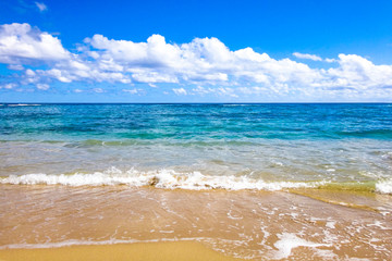 Blue tropical sea with clouds