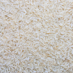 Grains of white parboiled rice, background, square