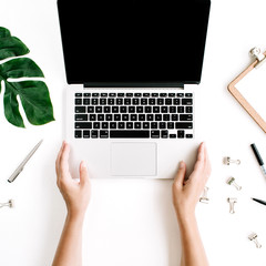 Woman working on laptop. Flat lay, top view workspace