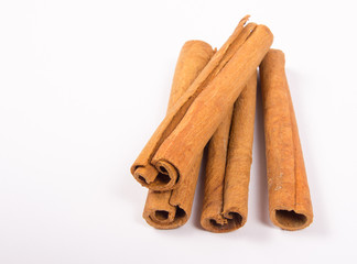 Cinnamon sticks isolated on white background.