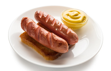 cooked sausage with mustard