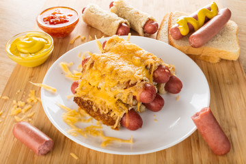 sausages in bread baked with cheese