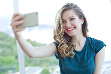Woman doing selfie phone 