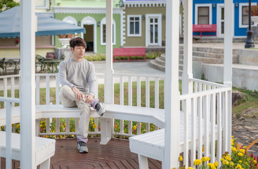 Asian Man Sit Inside Pavilion