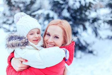 Fototapeta na wymiar Happy loving family!Frost winter season.