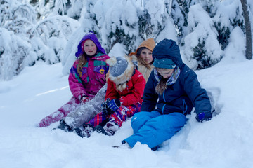 Fototapeta na wymiar Group of children in snow
