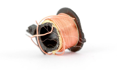 damaged small electric transformer on white