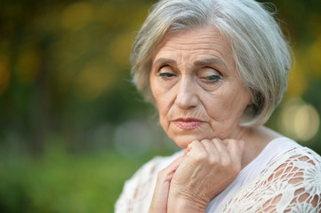 thoughtful senior woman