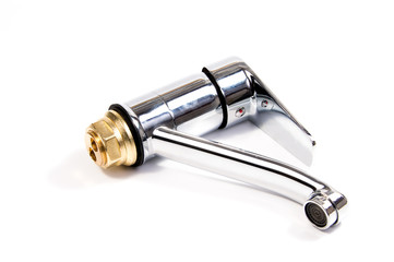 Modern stainless steel tap. Isolated on white background.