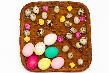 Easter eggs in basket white background