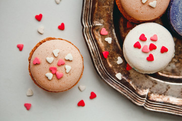 Beautiful and delicate background for Valentine's day and 8 March with macaroons and hearts