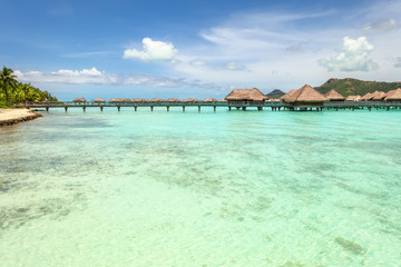 Over water bungalows into amazing green lagoon at Bora Bora isla