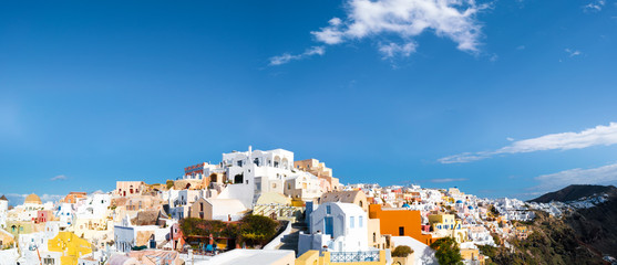 Panorama of Oia village with colorful houses  , view of Oia town, Santorini island, Greece