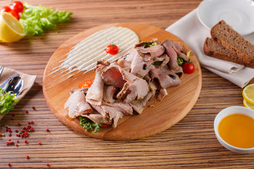 Fine meats with herbs and sauce