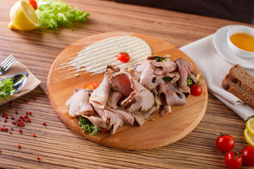 Fine meats with herbs and sauce