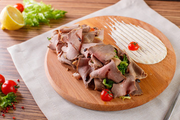 Fine meats with herbs and sauce