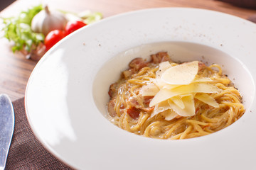 Pasta spaghetti carbonara on white background. Top view