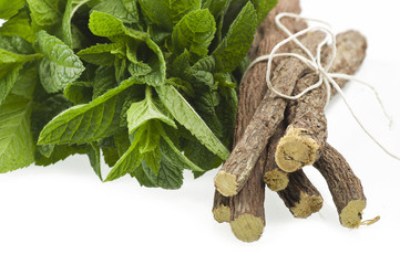 cinnamon,star anise,mint,licorice,close up on the white