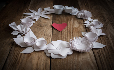paper flowers on the wood background