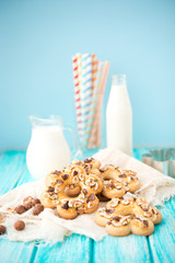Home-made cookies from shortcake dough with nuts and milk
