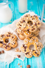 Home-made cookies from shortcake dough with nuts and milk
