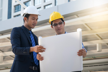 businessman worker handshaking on construction site