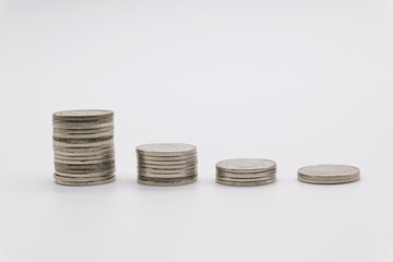 coins stacked on white background