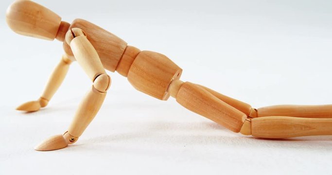 Figurine performing push-up exercise