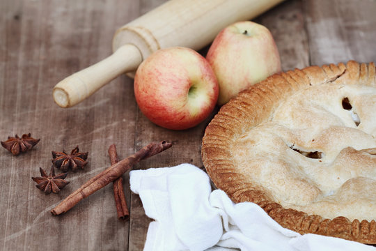 Apple Pie with Rolling Pin and Ingredients