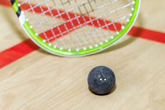squash racket and ball