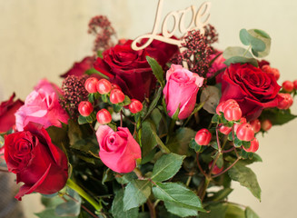 A bouquet of flowers and gifts for the holiday, for lovers, rose for women.