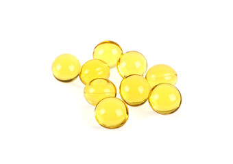 Cod liver oil omega 3 gel capsules on a white background