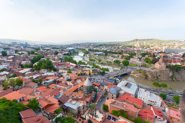 Fototapeta na wymiar Tbilisi city panorama. Old city, new Summer Rike park, river Kura, the European Square and the Bridge of Peace