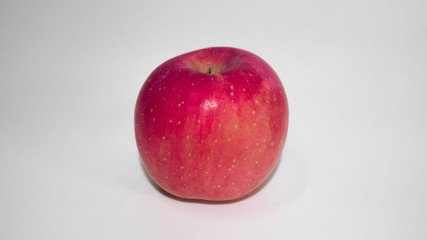 Fresh red apple isolated on white background