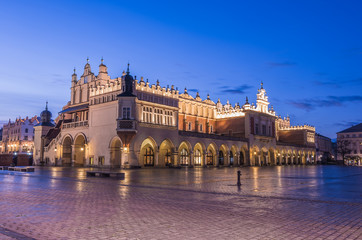 Fototapeta na wymiar Cloth Hall on the Main Market Square in Krakow, Poland, illuminated in the morning