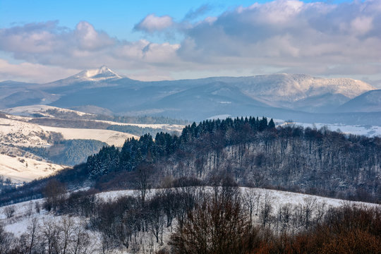 rural area in winter mountains