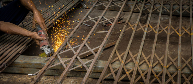 Welding A Rusty Metal Rolling Door Photo Taken In Jakarta Indonesia