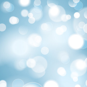 Bokeh background with circle light beams. Blurred blue background.