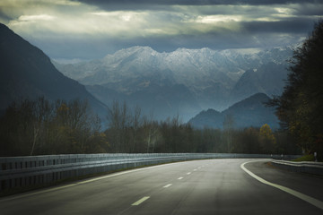 Alps Road highway cloudy mountains